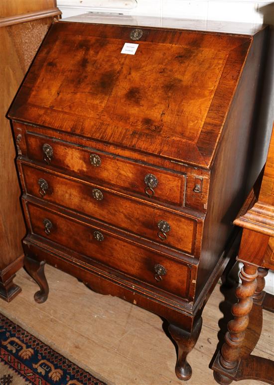 A Queen Anne style banded walnut bureau